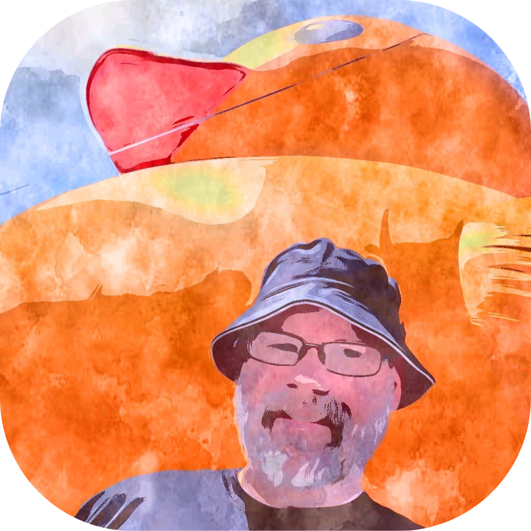 A highly filtered image of a caucasian man with glasses, a beard, and a bucket hat, smiling, and standing in front of Mama Duck, the world's largest rubber duck.