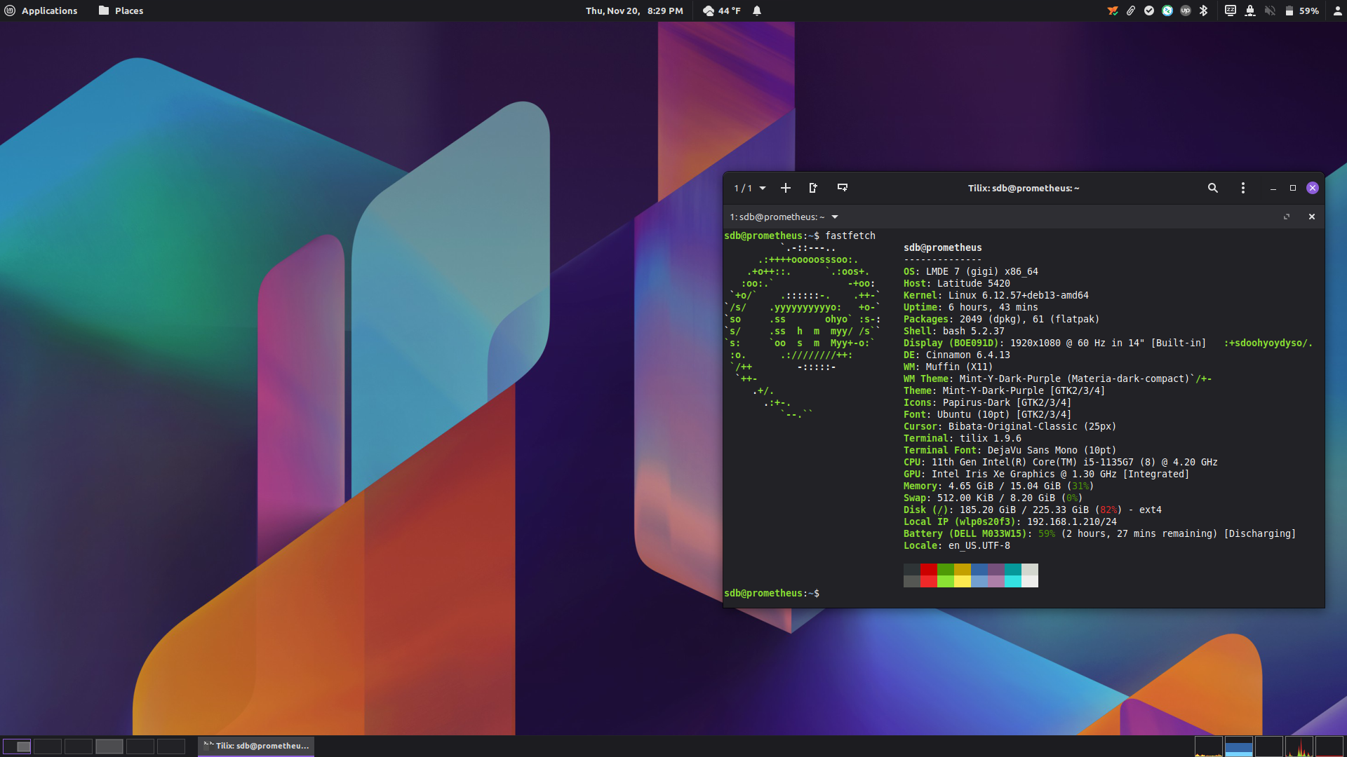 Screenshot of my computer, LMDE7, Cinnamon, top and bottom panels, a Tilix terminal window, and fastfetch output.